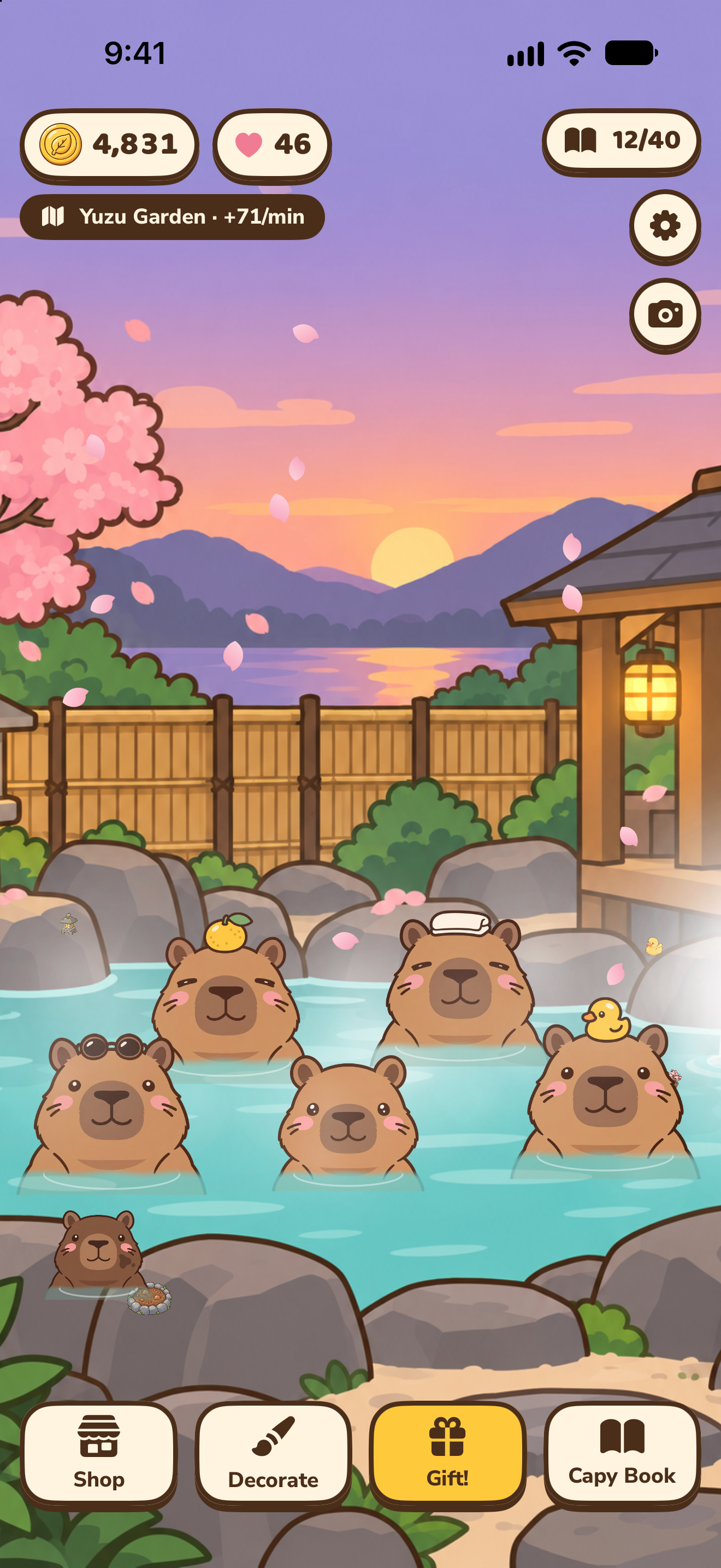 Capybaras soaking in a hot spring in the Yuzu Garden, with lanterns and coin tips